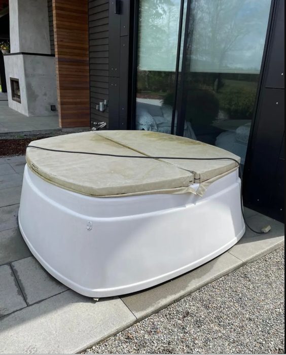 Hot tub shell removed from a patio