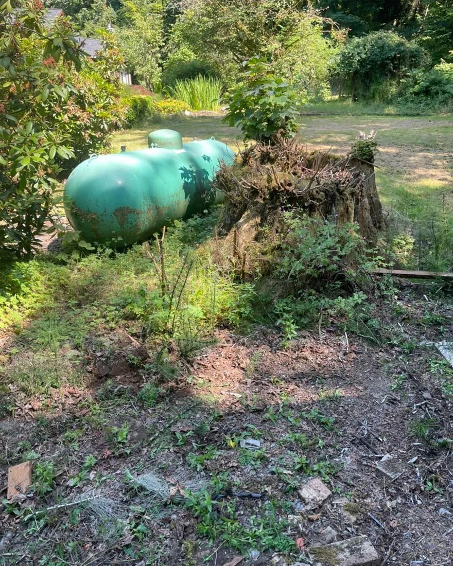 Propane tanks and debris collected for removal
